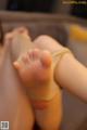 A close up of a woman's feet in a pair of stockings.